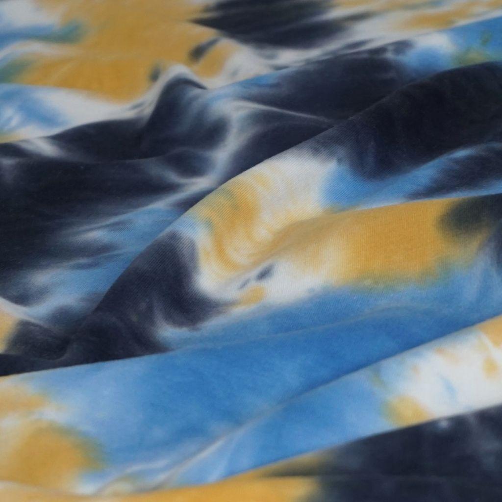 French Terry Batik blau schwarz gelb